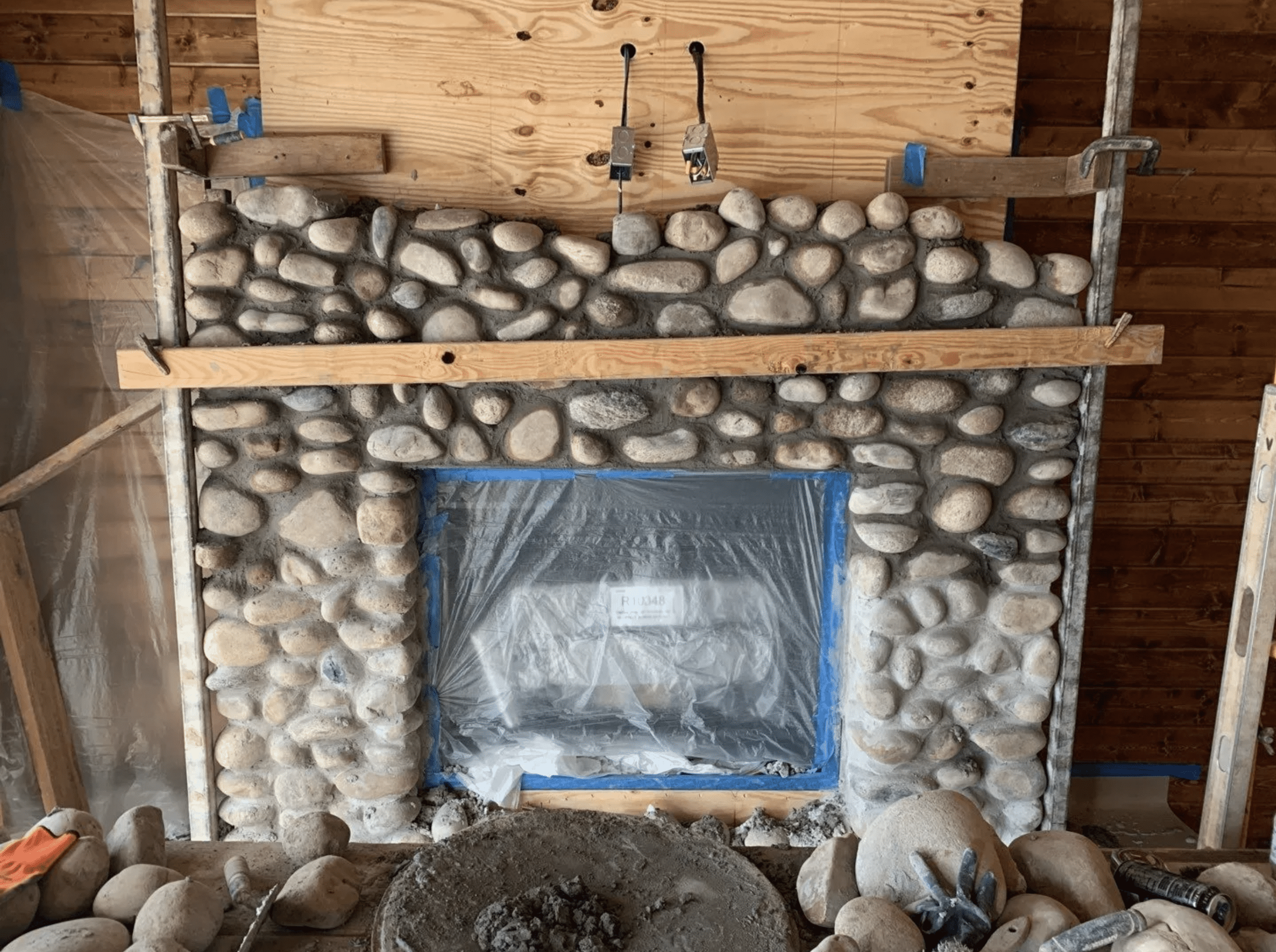 stone fire place under construction
