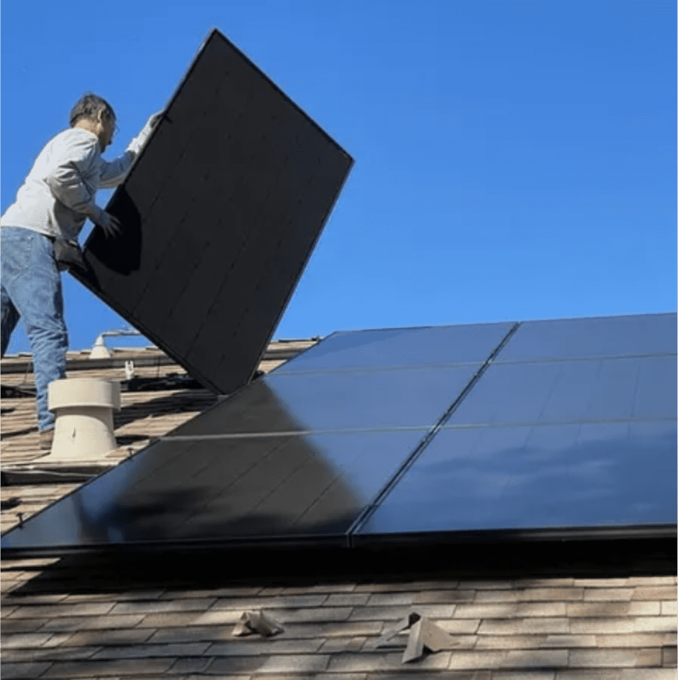 contractor installing solar panels