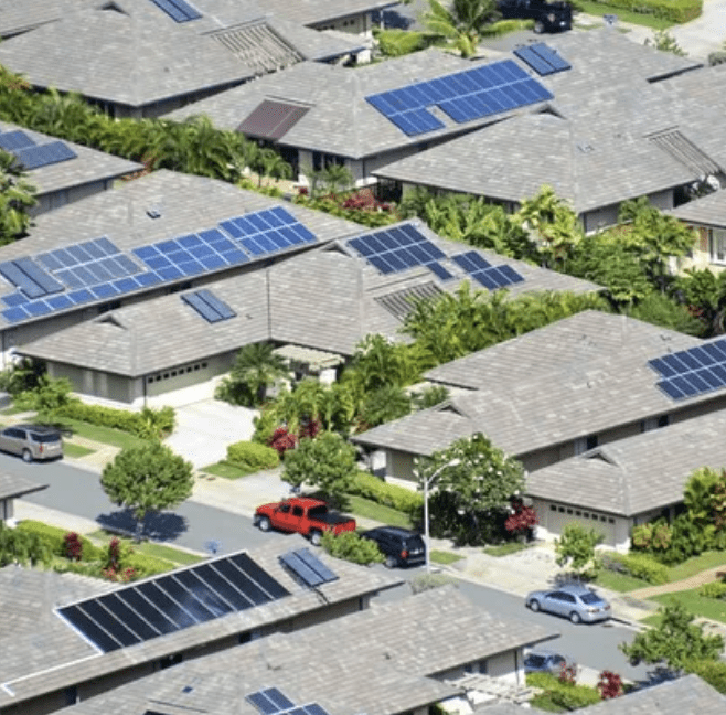 solar panels on rooftops in residential neighborhood