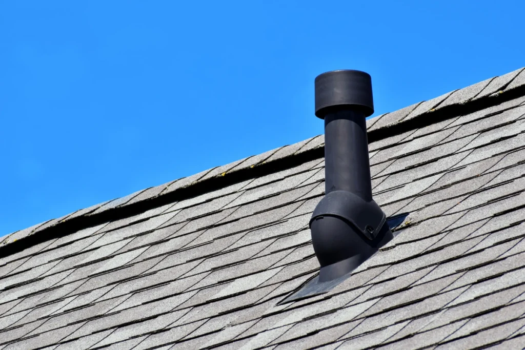 Powered roof vent newly installed on shingle roof