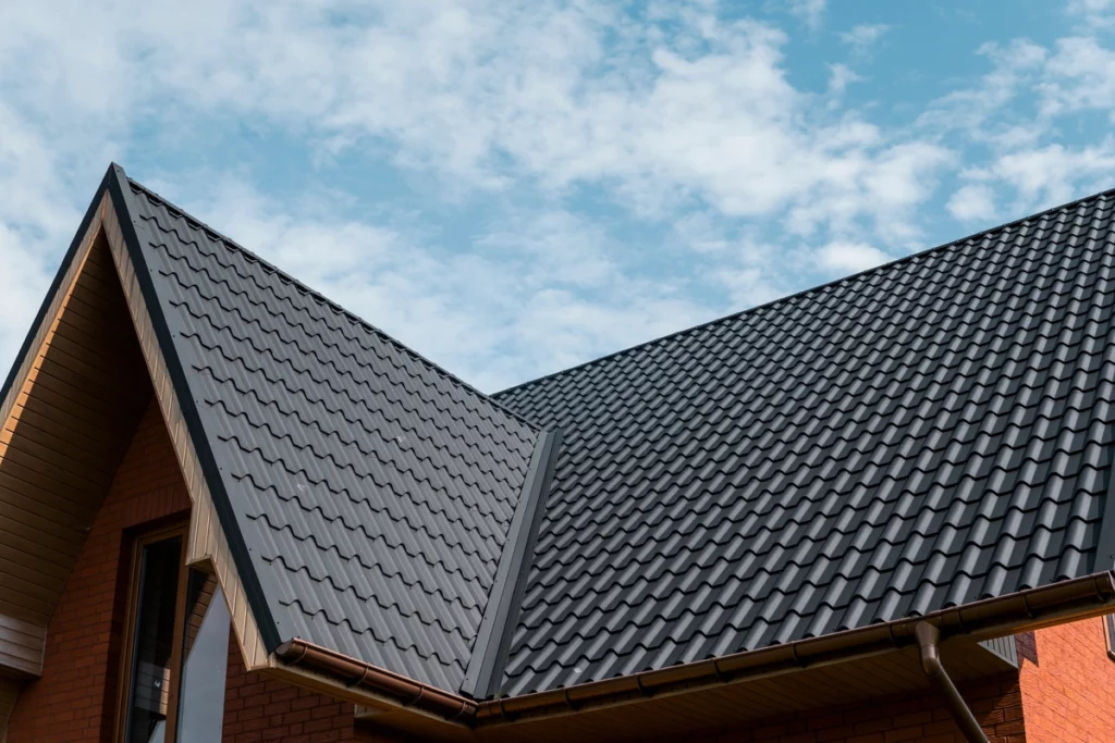 new installed black tile roof on modern house
