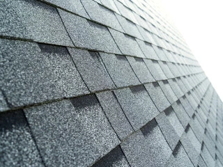 Closeup of gray composite shingles 