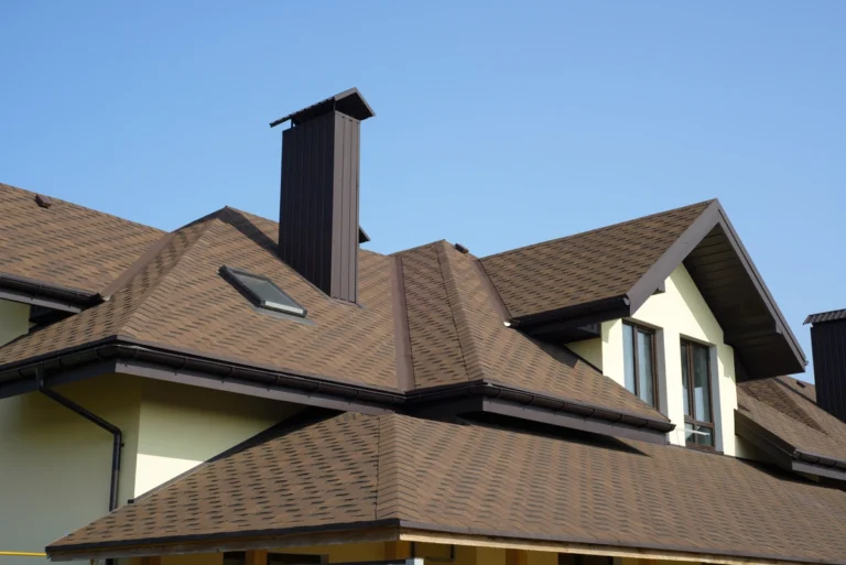 Brown CertainTeed Shingle Colors installed on home with skylight and chimney