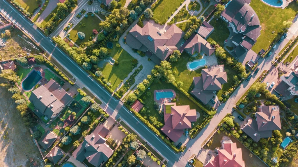 Aerial view of residential neighborhood - roofs and yards