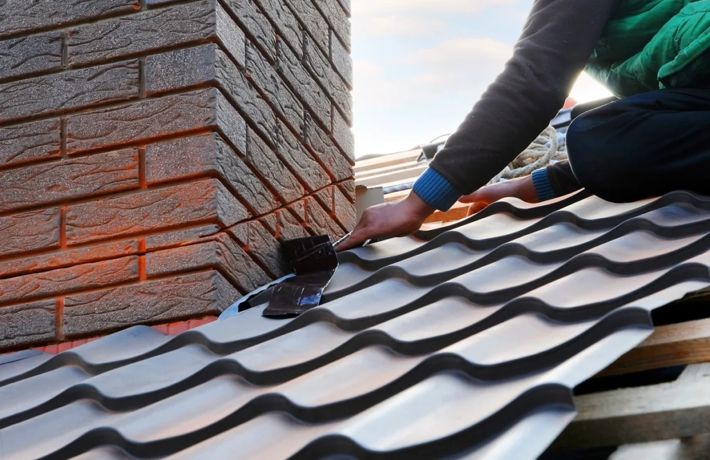 custom metal roofing-roof tech installing metal shingles