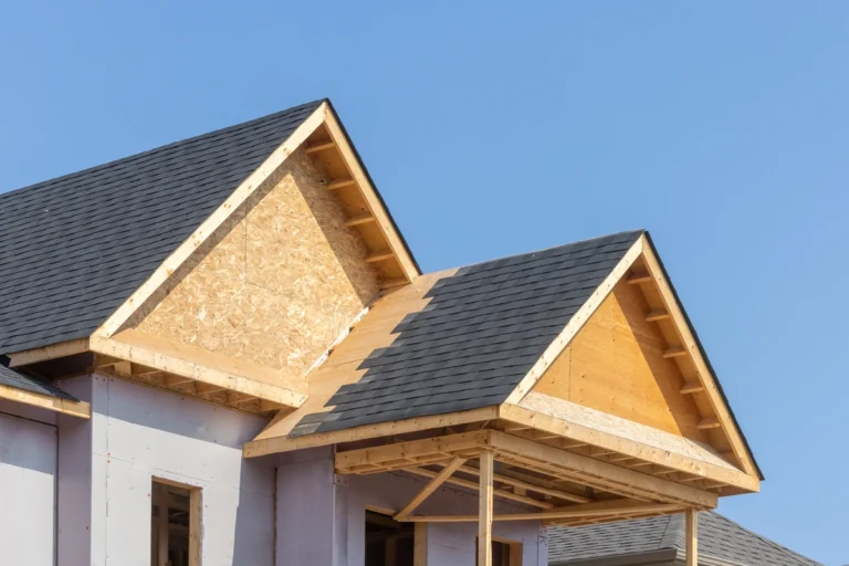 roof sheathing-shingles being installed over roof sheathing
