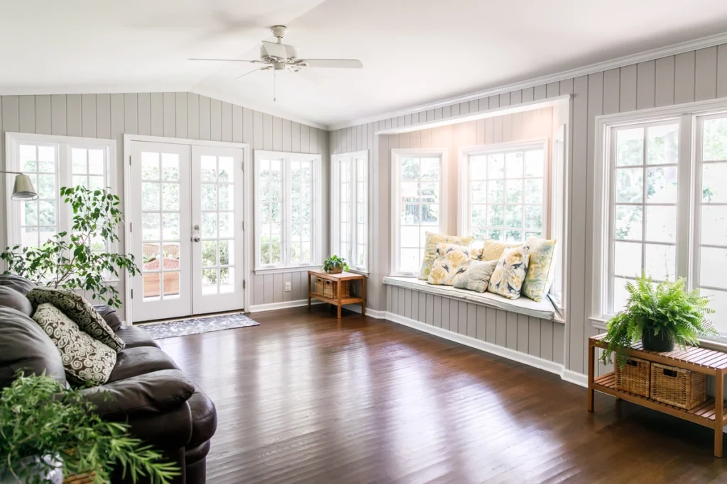 window replacement-interior living space with shiplapped walls and new windows