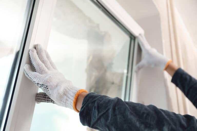 how to measure for replacement windows-gloved hands installing new windows