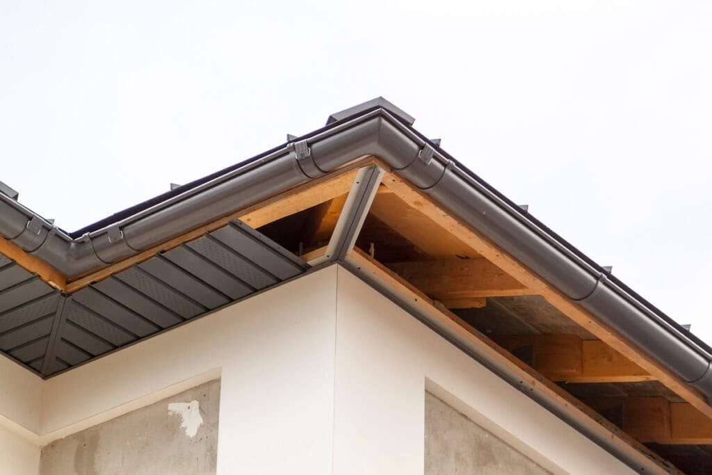 how to replace wood under roof overhang-view of exposed wood under roof overhang