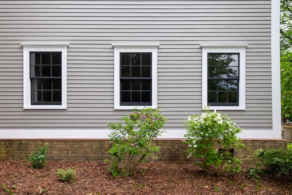 single hung window-lower level of a home with 3 single hung windows