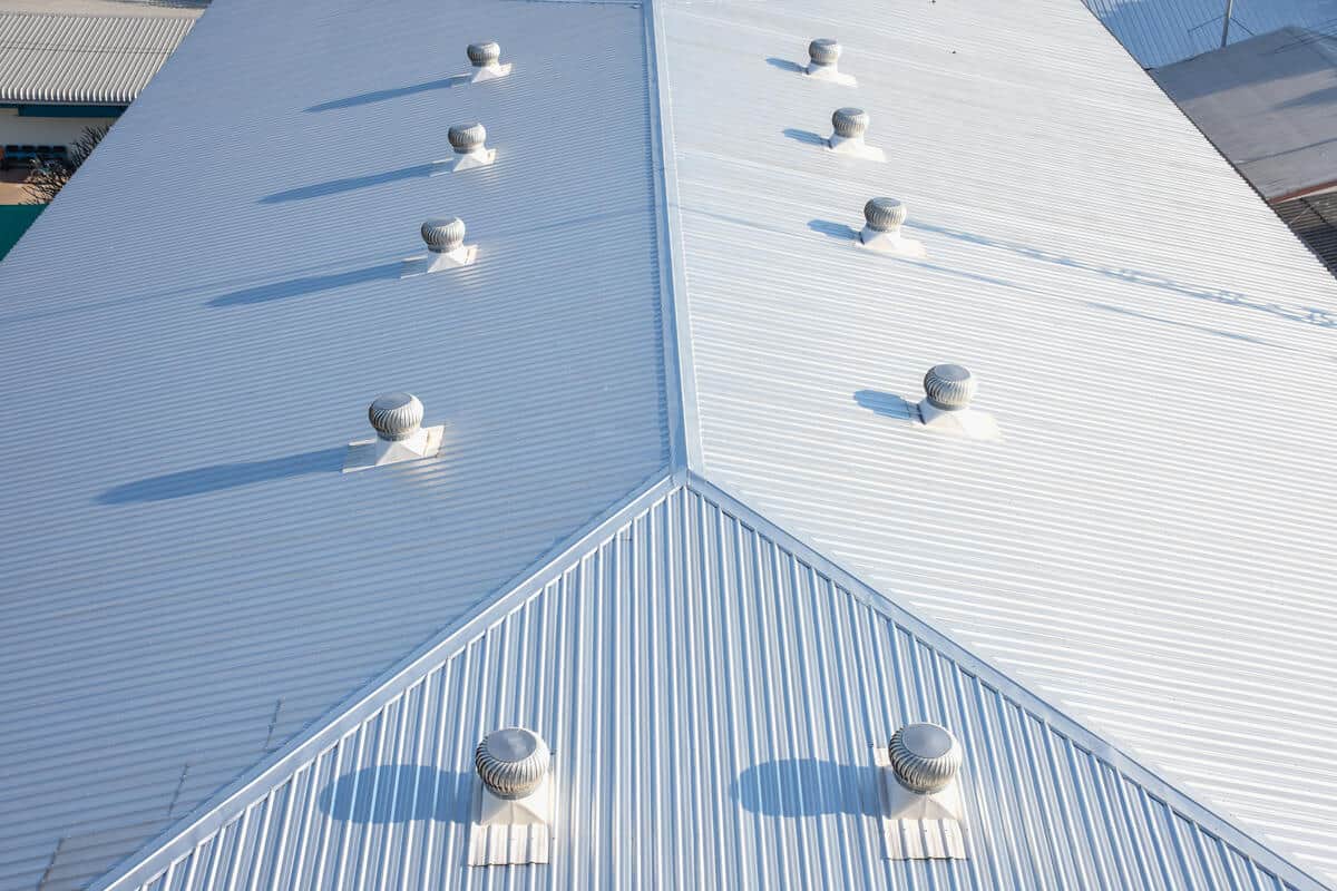 arial view of white metal commercial roof