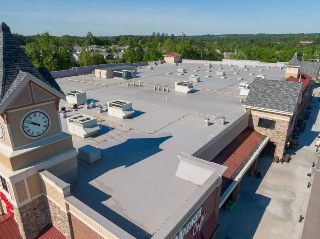 light colored commercial roofing material on large commercial building